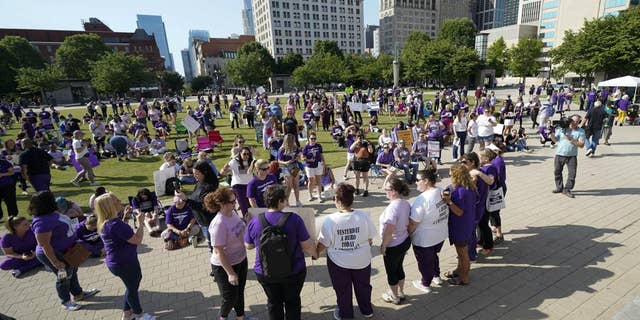 People demonstrate outside the courthouse where the sentencing hearing for former nurse RaDonda Vaught is being held Friday, May 13, 2022, in Nashville, Tenn.