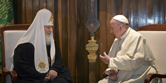 FILE PHOTO: FILE PHOTO: Pope Francis (R) and Russian Orthodox Patriarch Kirill meet in Havana February 12, 2016. Pope Francis arrived in Havana on Friday to meet the head of the Russian Orthodox Church nearly 1,000 years after Eastern Orthodoxy split with Rome, marking the first encounter in history between a Roman Catholic pope and a Russian Orthodox patriarch. REUTERS/Adalberto Roque/Pool/File Photo/File Photo