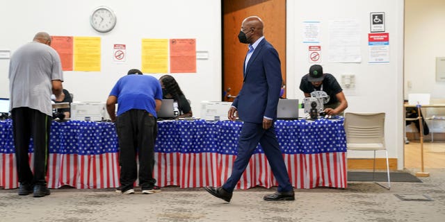 U.S. Sen. Raphael Warnock arrives at a polling station in Atlanta, Georgia, May 6, 2022.