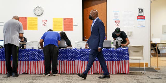 U.S. Sen. Raphael Warnock arrives at a polling station in Atlanta, Georgia, May 6, 2022.