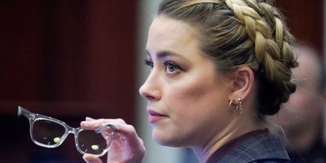 Amber Heard is reportedly "in talks" to write a tell-all book following her loss in court earlier this month against ex-husband Johnny Depp in their multi-million dollar defamation trial.