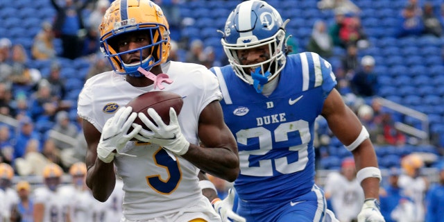 FILE - Pittsburgh wide receiver Jordan Addison (3) hauls in a pass for a touchdown against Duke safety Lummie Young IV (23) during the first half of an NCAA college football game Nov. 6, 2021, in Durham, N.C.