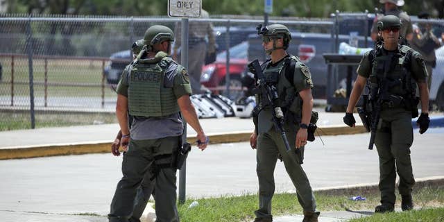 Who is the Texas school shooter? What we know 3 Law enforcement personnel stand outside Robb Elementary School following a shooting, Tuesday, May 24, 2022, in Uvalde, Texas.