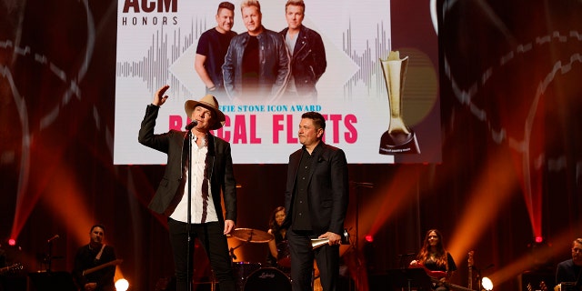 Joe Don Rooney and Jay DeMarcus of Rascal Flatts accept the Cliffie Stone Icon Award during the 14th Annual Academy Of Country Music Honors at Ryman Auditorium on August 25, 2021 in Nashville, Tennessee. (Photo by Jason Kempin/Getty Images for ACM)