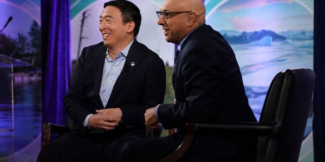 2020 Democratic presidential candidate and founder of Venture for America, Andrew Yang, and MSNBC's Ali Velshi participate in the "Climate Forum 2020," at Georgetown University's Gaston Hall in Washington, U.S., September 19, 2019.