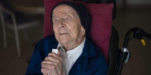 Lucile Randon, AKA Sister André, poses for a portrait at the Sainte Catherine Laboure care home in Toulon, southern France, on Wednesday, April 27, 2022, shortly after becoming the oldest person in the world. 