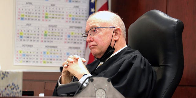FILE - Judge Patrick McAllister listens to arguments during a hearing in court, Thursday, March, 31, 2022 in Bath, N.Y. New York will now hold its congressional and state Senate primaries on Aug. 23, a McAllister ruled Friday.