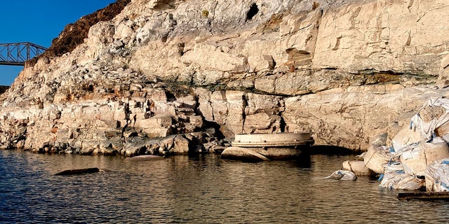 This photo taken Monday, April 25, 2022, by the Southern Nevada Water Authority shows the top of Lake Mead drinking water Intake No. 1 above the surface level of the Colorado River reservoir behind Hoover Dam. A barrel containing human remains was found at the lake on Sunday, police said. 