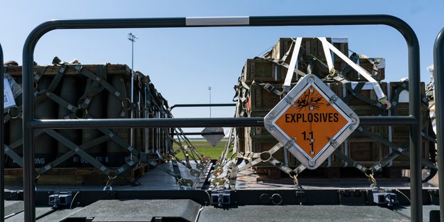 Pallets of 155 mm shells and fuses are loaded, ultimately bound for Ukraine, Friday, April 29, 2022, at Dover Air Force Base, Del. 