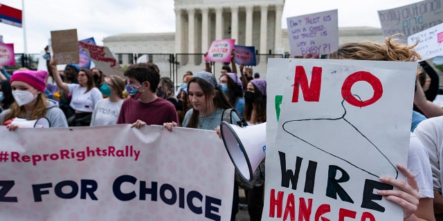 Demonstrators protest outside of the U.S. Supreme Court in Washington on May 5, 2022.