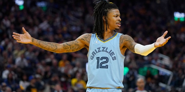 Memphis Grizzlies guard Ja Morant (12) responds to an official's call during the second half of Game 3 of the team's semifinal in the NBA Basketball Western Conference against the Golden State Warriors in San Francisco, Saturday, May 7, 2022.