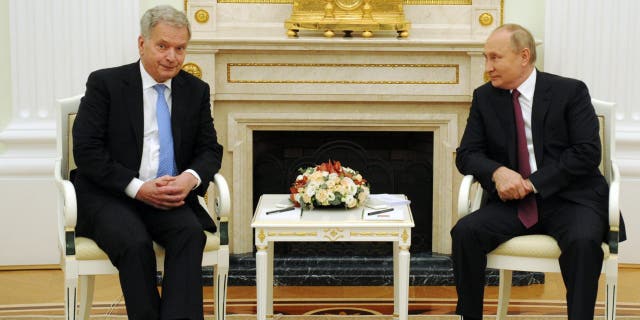 FILE - Russian President Vladimir Putin, right, and Finnish President Sauli Niinisto talk during their meeting in the Kremlin in Moscow, Russia, Oct. 29, 2021. Niinisto, the Western leader who appeared to have the best rapport with Putin before the Ukraine war, is expected to announce his stance on NATO membership on Thursday, May 12, 2022. 