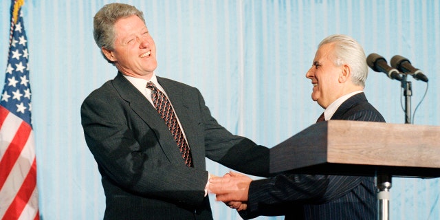 FU.S. President Bill Clinton and Ukrainian President Leonid Kravchuk shake hands following their press conference at Kyiv's airport, Jan. 12, 1994.