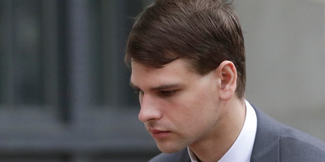 Nathan Carman departs federal court, Wednesday, Aug. 21, 2019, in Providence, R.I.