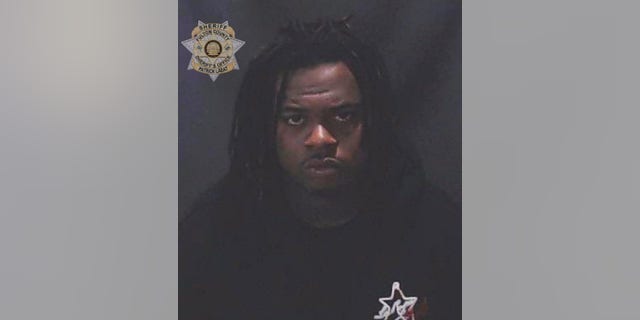 This image provided by the Fulton County Sheriff's Office shows rapper Gunna, whose given name is Sergio Kitchens.