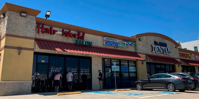 This photo shows the exterior of Hair World Salon in Dallas on Thursday, May 12, 2022. (AP Photo/Jamie Stengle)