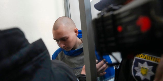 Russian army Sergeant Vadim Shishimarin, 21, arrives for a court hearing in Kyiv, Ukraine, Friday, May 13, 2022. The trial of a Russian soldier accused of killing a Ukrainian civilian opened Friday, the first war crimes trial since Moscow's invasion of its neighbor. (G3 Box News Photo/Efrem Lukatsky)