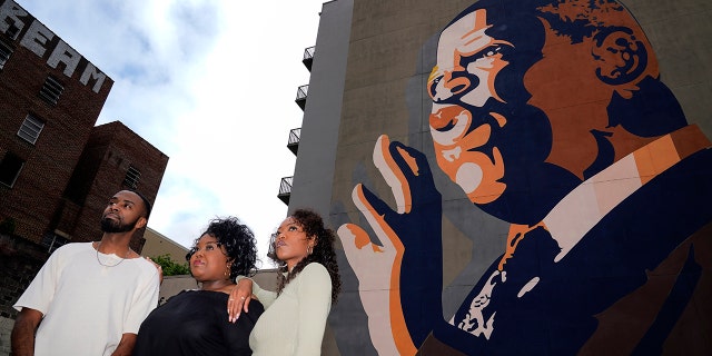 Shalomyah Bowers, left, Cicley Gay, center, and D'Zhane Parker pose for a portrait on Friday, May 13, 2022, in Atlanta.