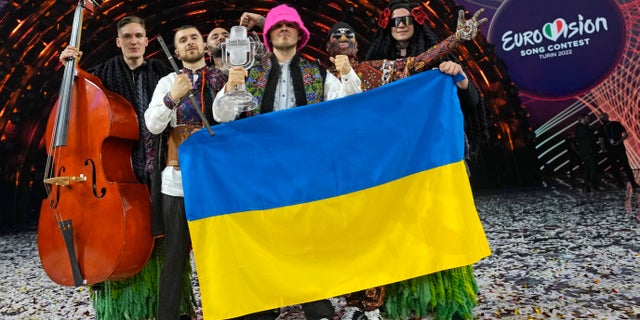 Kalush Orchestra from Ukraine celebrate after winning the Grand Final of the Eurovision Song Contest at Palaolimpico arena, in Turin, Italy, Saturday, May 14, 2022. (G3 Box News Photo/Luca Bruno)