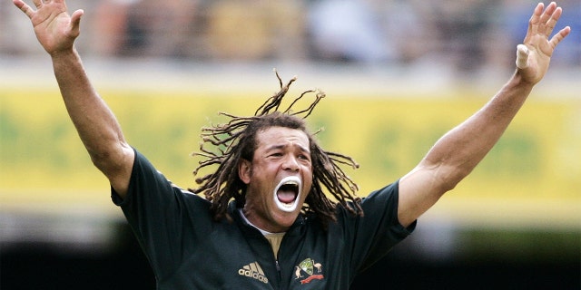 Australia's Andrew Symonds yells as he appeals for a decision against England's Jamie Dalrymple in their one-day international cricket match in Brisbane, Australia, Jan. 19, 2007. Symonds died Saturday, May 14, 2022, after a single-vehicle accident near Townsville in northeast Australia. He was 46.
