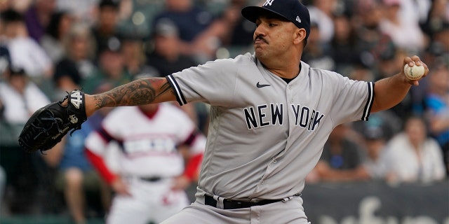New York Yankees starting pitcher Nestor Cortes throws against the Chicago White Sox during the first inning of a baseball game in Chicago, Sunday, May 15, 2022.