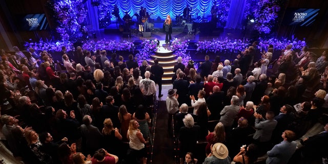 Wynonna Judd performs during a tribute to her mother, country music star Naomi Judd, in the Ryman Auditorium Sunday, May 15, 2022, in Nashville.