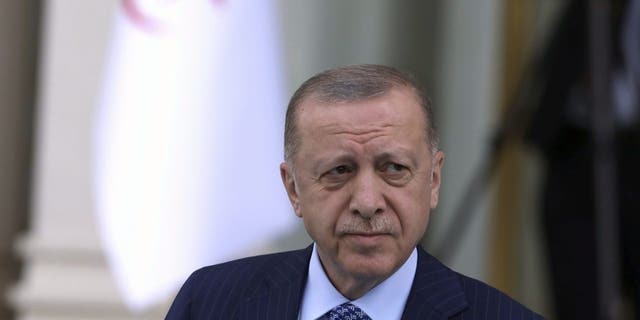 Turkish President Recep Tayyip Erdogan arrives for a welcoming ceremony for his Algerian counterpart, Abdelmadjid Tebboune, in Ankara, Turkey, Monday, May 16, 2022.
