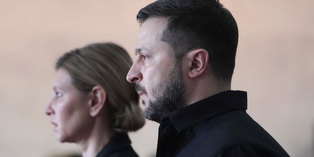 President of Ukraine Volodymyr Zelenskyy and his wife Olena Zelenska attend the funeral of Leonid Kravchuk, independent Ukraine's first president, at the International Convention Center Ukrainian House, in Kyiv, Ukraine, Tuesday, May 17, 2022. Kravchuk led Ukraine to independence amid the collapse of the Soviet Union and served as its first president. He died on May 10 at the age of 88.