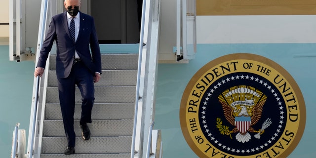 U.S. President Joe Biden, disembarks from Air Force One on his arrival at Osan Air Base in Pyeongtaek, South Korea, Friday, May 20, 2022. (AP Photo/Lee Jin-man, Pool)