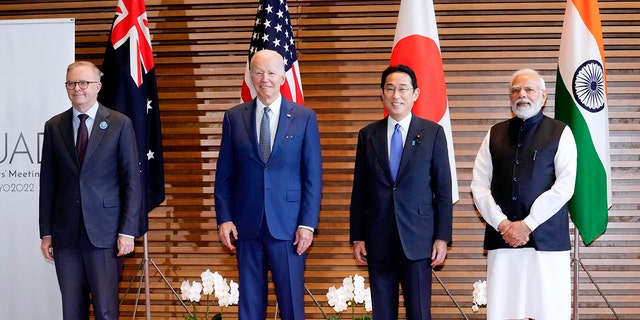 Leaders of Quadrilateral Security Dialogue (Quad) from left to right, Australian Prime Minister Anthony Albanese, US President Joe Biden, Japanese Prime Minister Fumio Kishida, and Indian Prime Minister Narendra Modi, pose for photo at the entrance hall of the Prime Minister's Office of Japan in Tokyo, Japan, Tuesday, May 24, 2022. (Sadayuki Goto/Kyodo News via AP)