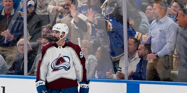 Fans react after a goal by Colorado Avalanche's Nazem Kadri during the second period in Game 4 of a second round NHL Hockey Stanley Cup playoff series against the St. Louis Blues. 