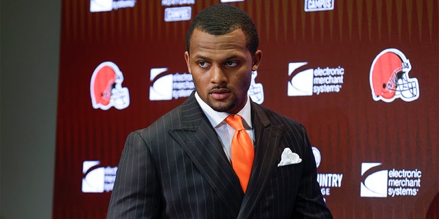 FILE - Cleveland Browns new quarterback Deshan Watson enters a news conference at the NFL football team's training facility on March 25, 2022 in Berea, Ohio.