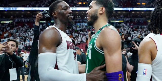Celtics hold off Heat in Game 7, reach NBA Finals 3 Miami Heat center Bam Adebayo (13) congratulates Boston Celtics forward Jayson Tatum (0) after the Celtics won Game 7 of the NBA basketball Eastern Conference finals playoff series, Sunday, May 29, 2022, in Miami.