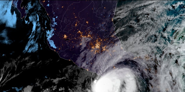 This satellite image made available by NOAA shows Hurricane Agatha off the Pacific coast of Oaxaca state, Mexico on Monday, May 30, 2022, at 8:30 a.m. EDT. (NOAA via AP)