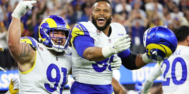 Los Angeles Rams defensive end Aaron Donald (99) celebrates his sack of Cincinnati Bengals quarterback Joe Burrow (9) near the end of in Super Bowl LVI at SoFi Stadium on Sunday, Feb. 13, 2022 in Inglewood, CA.