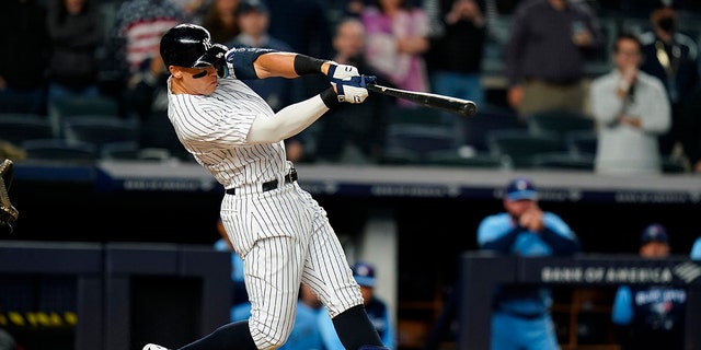 Yankees' Aaron Judge hits a three-run home run against the Toronto Blue Jays Tuesday, May 10, 2022, in New York.