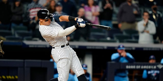 Yankees' Aaron Judge hits a three-run home run against the Toronto Blue Jays Tuesday, May 10, 2022, in New York.