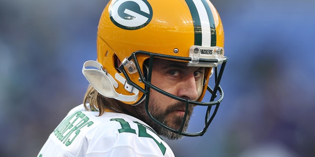 Quarterback Aaron Rodgers of the Green Bay Packers warms up against the Baltimore Ravens at M and T Bank Stadium Dec. 19, 2021, in Baltimore.