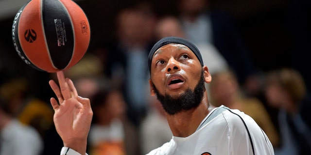 Adreian Payne plays with a ball during a Euroleague basketball match in Villeurbanne, France, on Oct. 4, 2019.