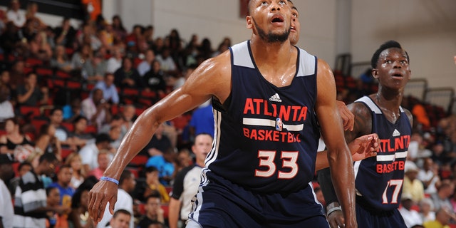 Adreian Payne of the Atlanta Hawks looks for a rebound against the Golden State Warriors on July 16, 2014, at the Cox Pavilion in Las Vegas, Nevada.