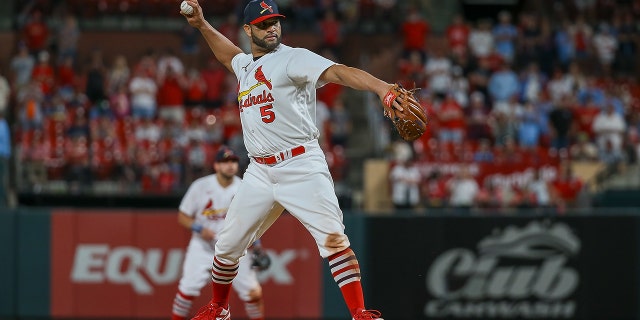 Albert Pujols #5 of the St. Louis Cardinals pitches during the ninth inning against the San Francisco Giants at Busch Stadium on May 15, 2022 in St. Louis, Missouri.