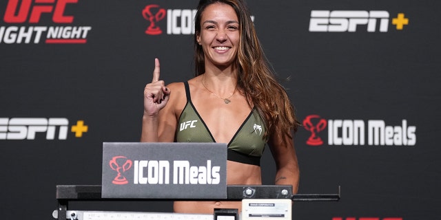 Amanda Ribas of Brazil poses on the scale during the UFC Fight Night weigh-in at UFC APEX on May 13, 2022 a Las Vegas, Nevada.
