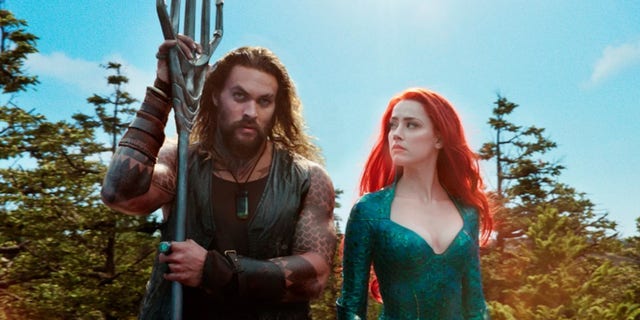 Amber Heard and Jason Momoa in 'Aquaman.'