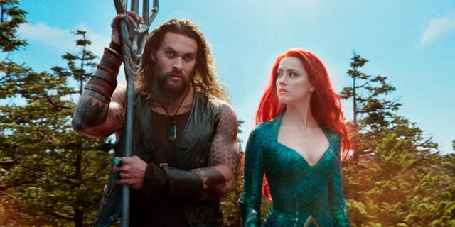 Amber Heard and Jason Momoa in 'Aquaman.'