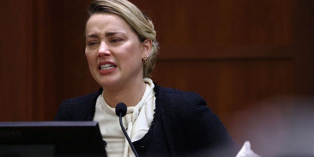 Amber Heard testifying May 5, 2022, in ex-husband Johnny Depp's defamation trial against her.