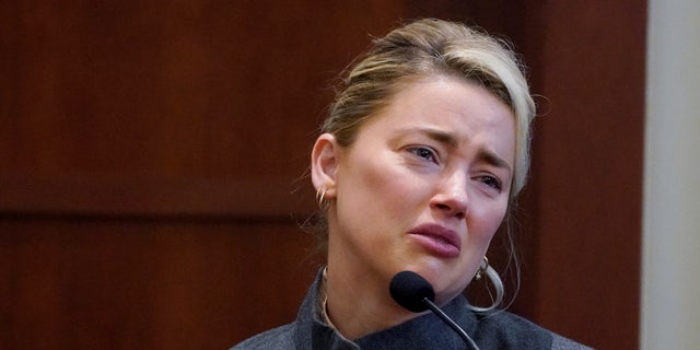 Actor Amber Heard testifies in the courtroom at the Fairfax County Circuit Courthouse in Fairfax, Virginia, U.S., May 16, 2022.