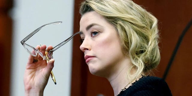 Amber Heard filed a notice of appeal Thursday to challenge the verdict in Johnny Depp's defamation case against her after a jury determined the "Aquaman" actress owed her ex-husband $10.35 million in damages.