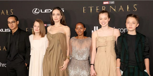 Maddox Jolie-Pitt, Vivienne Jolie-Pitt, Angelina Jolie, Zahara Jolie-Pitt, Shiloh Jolie-Pitt and Knox Jolie-Pitt attend Marvel Studios’ "Eternals" premiere on Oct. 18, 2021, in Los Angeles, California.