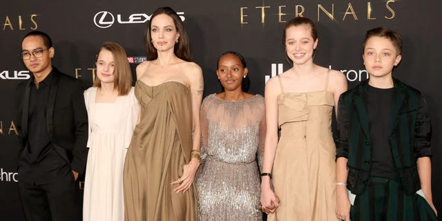 Maddox Jolie-Pitt, Vivienne Jolie-Pitt, Angelina Jolie, Zahara Jolie-Pitt, Shiloh Jolie-Pitt and Knox Jolie-Pitt attend Marvel Studios’ "Eternals" premiere on Oct. 18, 2021, in Los Angeles, California.