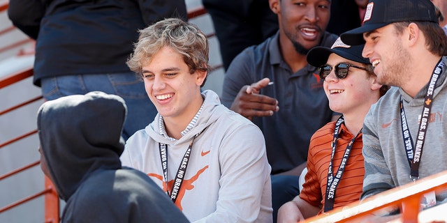  Arch Manning of Isidore Newman School attends the game between the Texas Longhorns and the Oklahoma State Cowboys at Darrell K Royal-Texas Memorial Stadium on Oct. 16, 2021 in Austin.